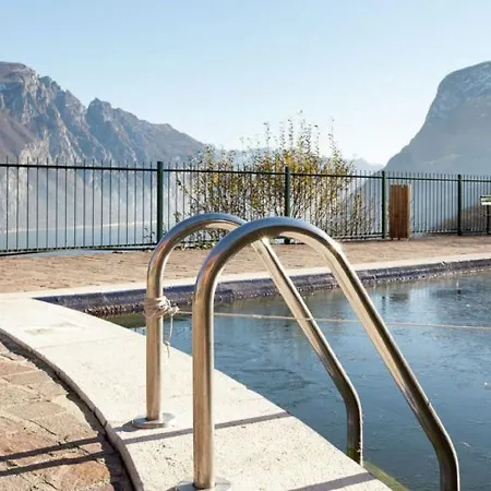 Апартаменты Pleasant Apartment In Valbrona With Shared Pool